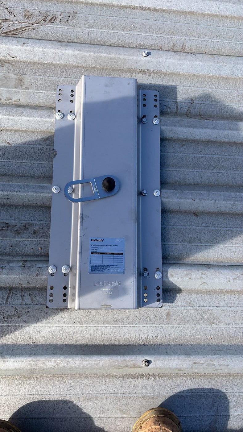 Rope access anchor point installed on a roof in Melbourne, rated for suspended abseiling work