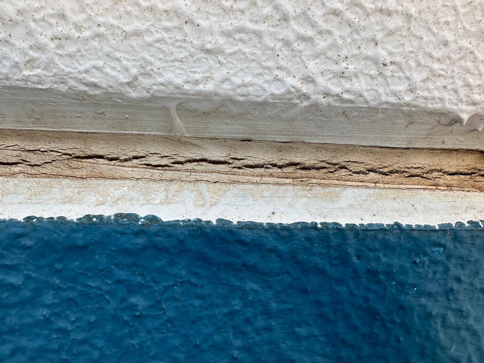 Cracked perished building sealant needing recaulking Melbourne